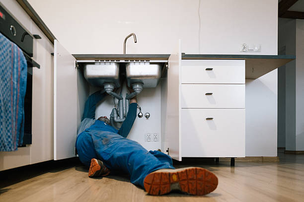 Professional Plumbing technician working in Millington, NJ